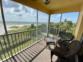 Vacation Villas #335 - Tropical Beachfront condo with a stellar view and screened lanai!